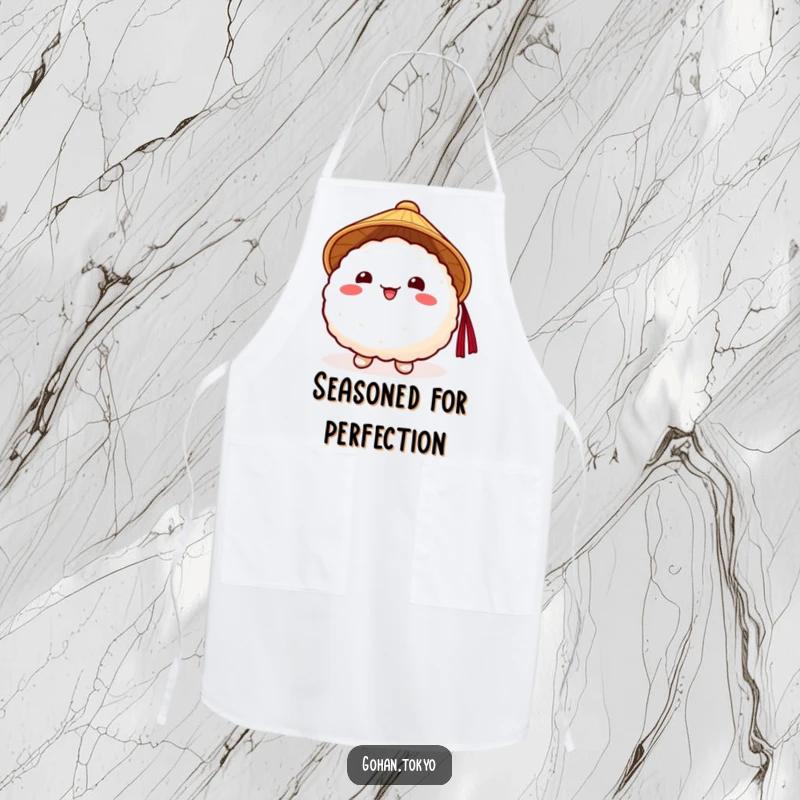 Funny Rice Ball Apron showcasing a cheerful character in a traditional Japanese hat, ideal for cooking and kitchen fun.